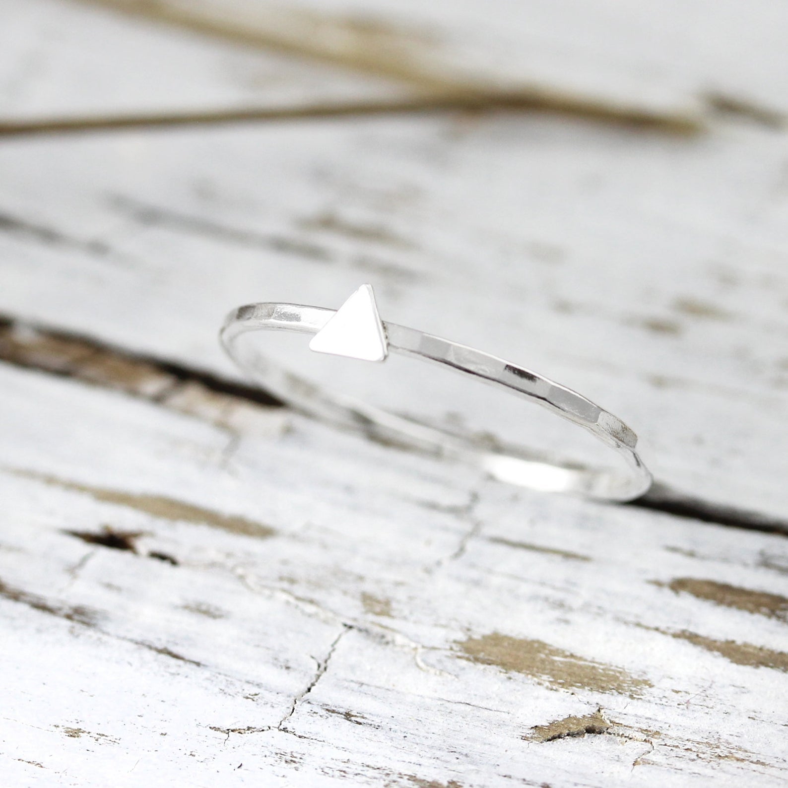 Ring with mini triangle