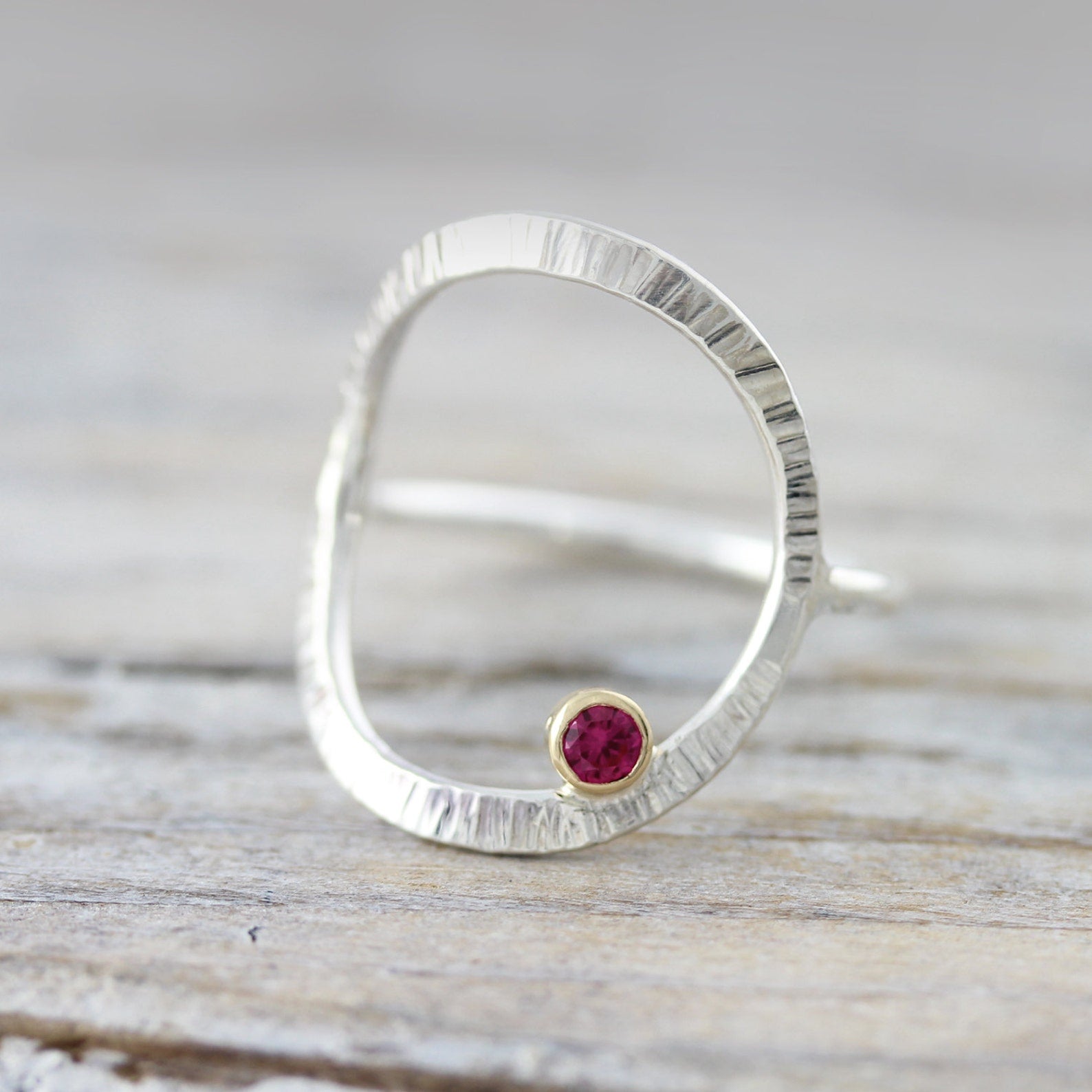 Forged ring with ruby