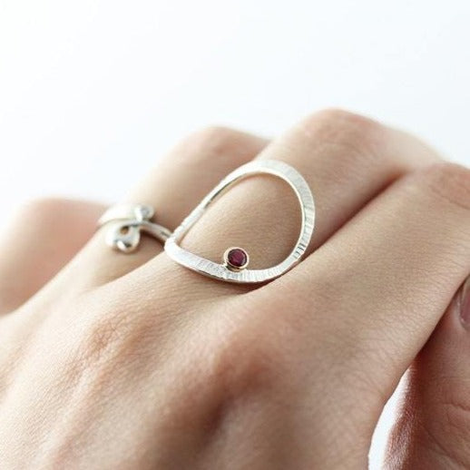 Forged ring with ruby