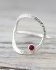 Forged ring with ruby