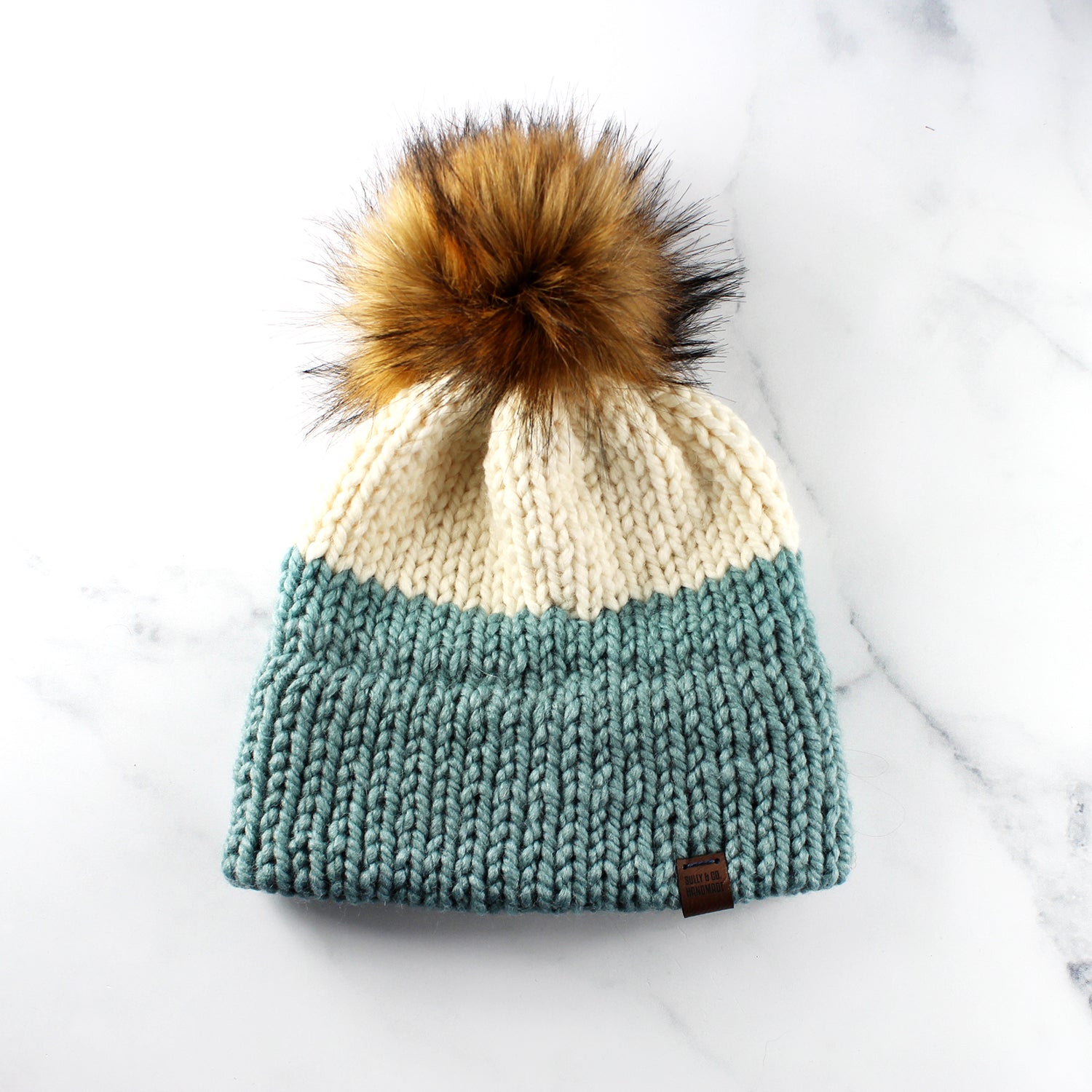 Two-tone pompom hat