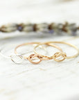 Extra thin knot ring