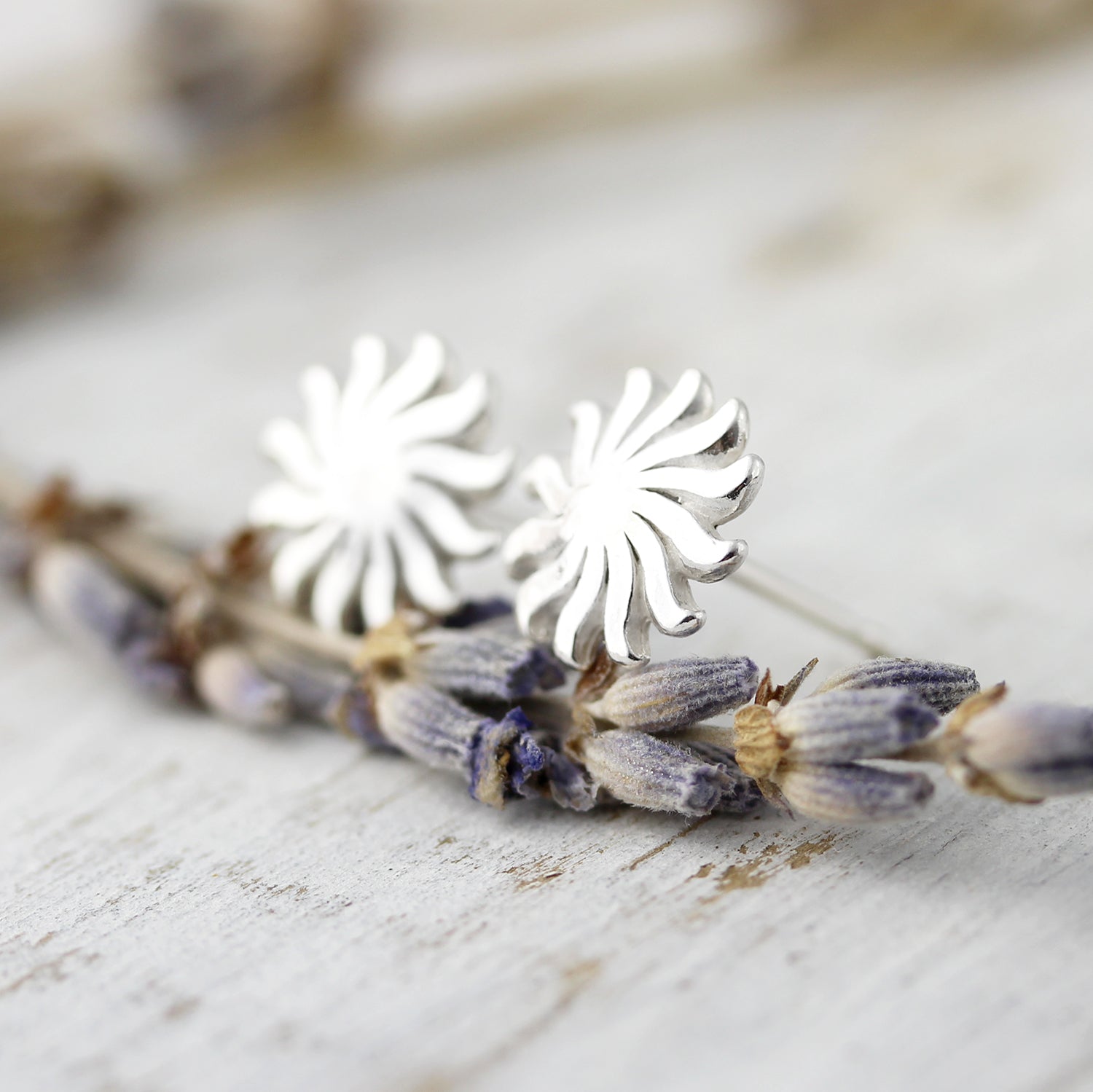 Boucles d&#39;oreilles soleils ondulés