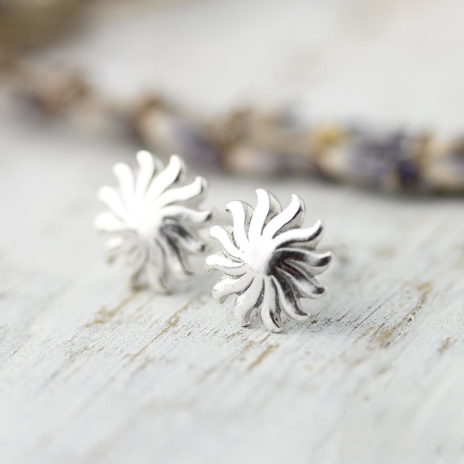 Boucles d'oreilles soleils ondulés