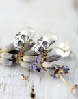 Boucles d'oreilles mini crânes