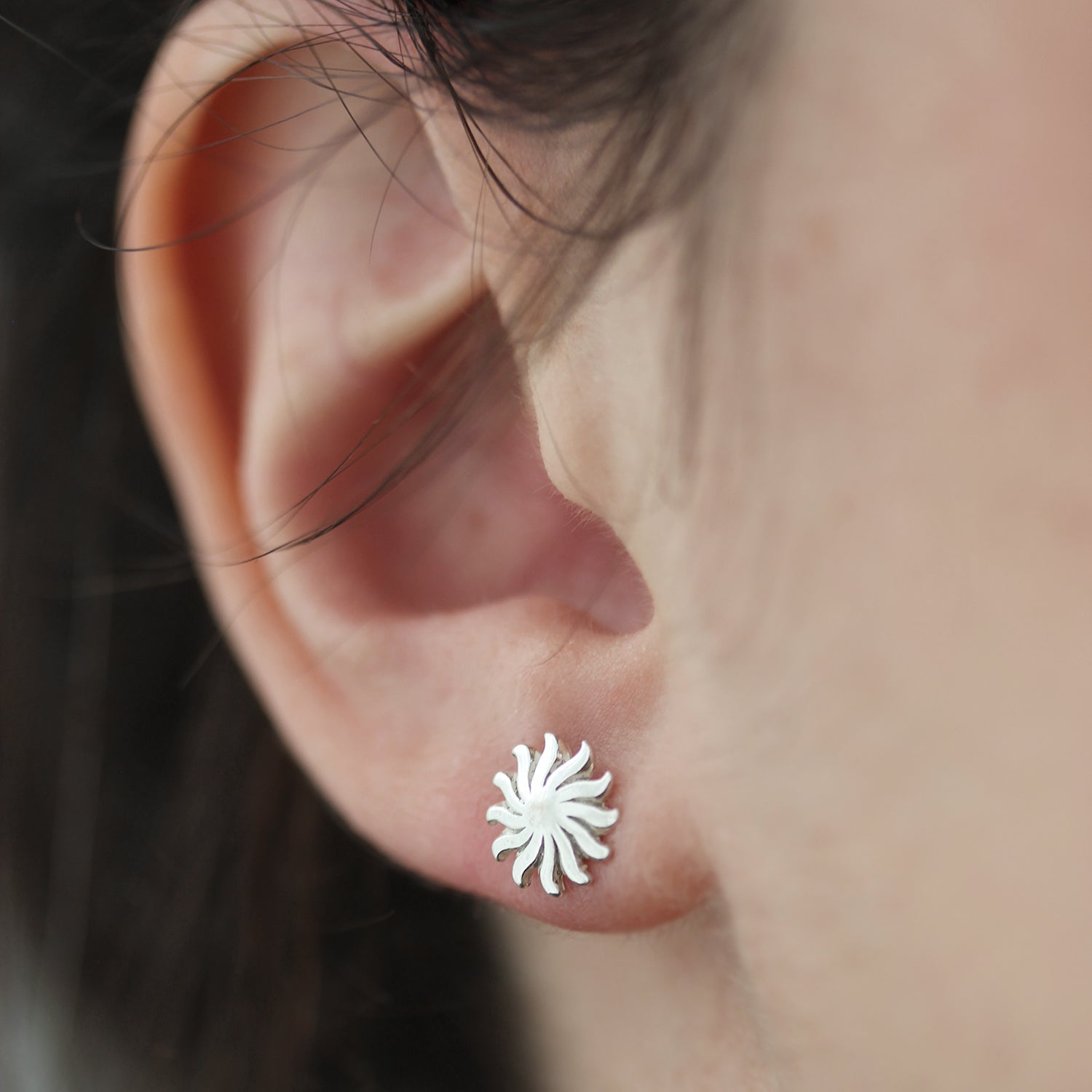 Boucles d'oreilles soleils ondulés