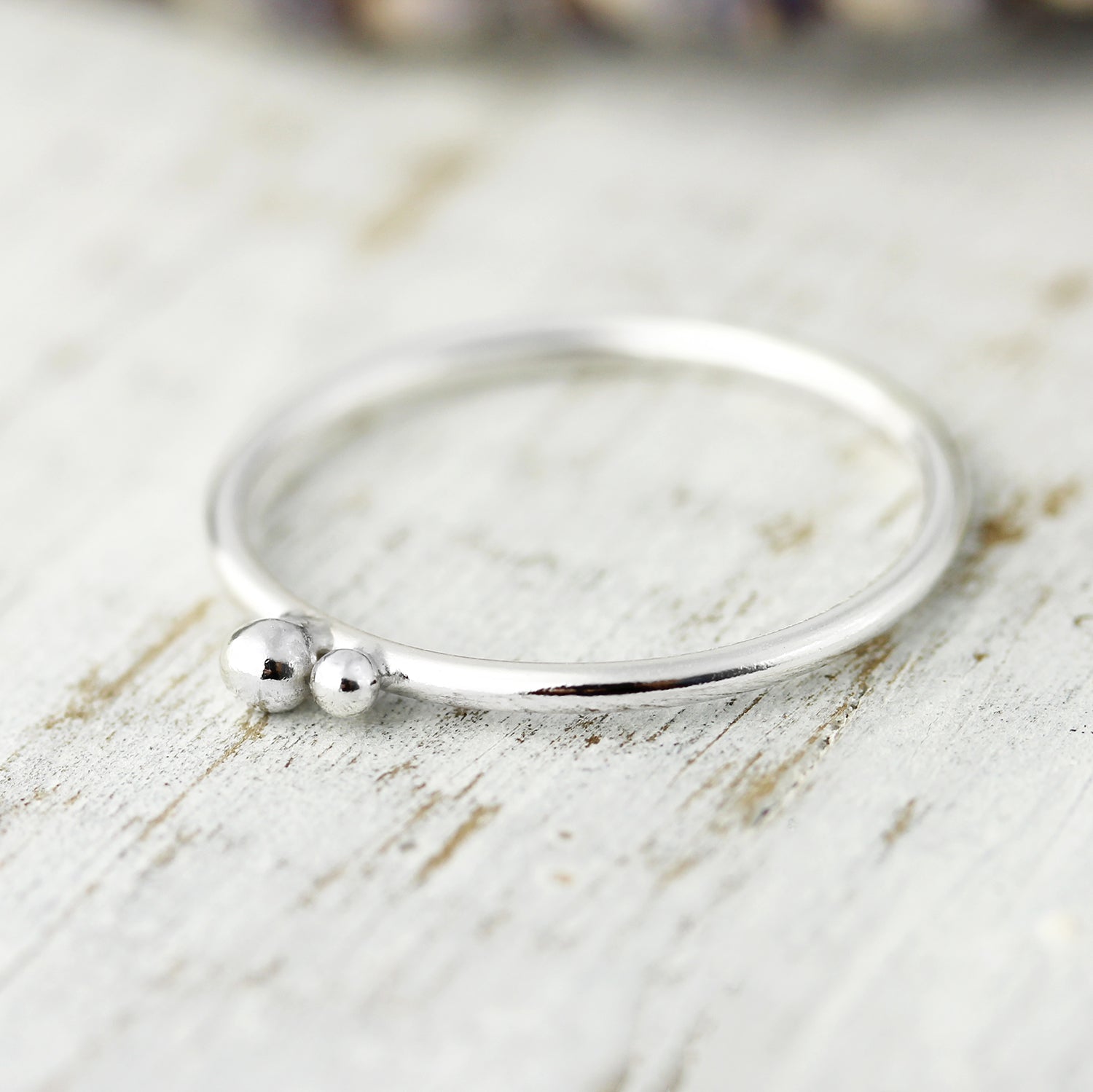 Ring with two silver balls