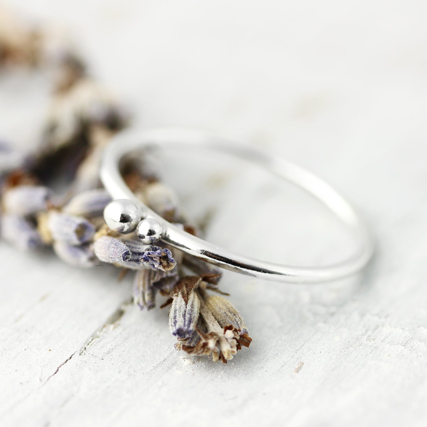 Ring with two silver balls