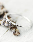 Ring with two silver balls