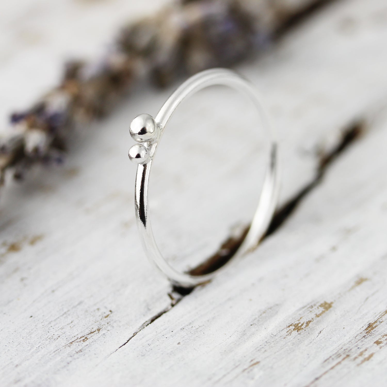 Ring with two silver balls